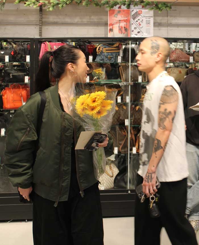 women with flowers at deep ellum store